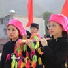 Thiếu nữ Tày rạng rỡ tại lễ hội. (Ảnh: Đinh Thùy/TTXVN)