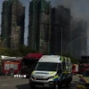 Hiện trường vụ cháy quần thể chung cư ở quận Tai Po, Hong Kong (Trung Quốc) (Ảnh: Mạc Luyện//TTXVN)