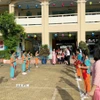 Khai giảng năm học mới tại Trường Tiểu học Bùi Văn Mới (phường Phước Long, Thành phố Hồ Chí Minh). (Ảnh: Thu Hoài/TTXVN)