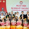 Tổng Bí thư Tô Lâm, Chủ tịch Quốc hội Trần Thanh Mẫn và các đại biểu dự Ngày hội Đại đoàn kết toàn dân tộc tại liên địa bàn dân cư phường Ba Đình, Hà Nội. (Ảnh: Thống Nhất/TTXVN)