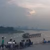 Hoàng hôn tại ngã ba sông Hồng-sông Đuống (Hà Nội). (Ảnh: Tuyết Mai/TTXVN)
