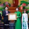 Chủ tịch nước Lương Cường trao danh hiệu Anh hùng lao động cho Tập đoàn ThaiBinh Seed. (Ảnh PV/TTXVN)
