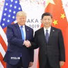 Chủ tịch Trung Quốc Tập Cận Bình (phải) trong cuộc gặp Tổng thống Mỹ Donald Trump tại Osaka, Nhật Bản ngày 29/6/2019. (Ảnh: THX/TTXVN)