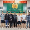 Nhóm đối tượng cho vay lãi nặng bị Công an Đồng Nai tạm giữ. (Ảnh: Công an Đồng Nai/TTXVN phát)