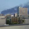 Khói bốc lên sau cuộc không kích của Israel tại Tehran, Iran. (Ảnh: THX/TTXVN)