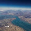 Quang cảnh bờ biển Iran và đảo Qeshm ở eo biển Hormuz. (Ảnh: REUTERS/TTXVN)
