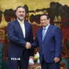 Thủ tướng Phạm Minh Chính tiếp ông Nasser Sulaiman Al Harthy, Phó Chủ tịch Cơ quan đầu tư Oman (OIA). (Ảnh: Dương Giang/TTXVN)