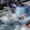 Hỏa hoạn lớn thiêu rụi hàng nghìn m2 nhà xưởng tại Khu công nghiệp Khai Quang, phường Vĩnh Phúc. (Ảnh: Hoàng Hùng/TTXVN)