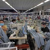 Công ty TNHH Việt Thắng JEAN mỗi năm xuất khẩu hàng triệu sản phẩm sang thị trường EU, Mỹ, Nhật Bản, Hàn Quốc. (Ảnh: Trần Việt/TTXVN)