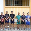 Các đối tượng bị bắt tạm giam. (Ảnh: Công Mạo/TTXVN)