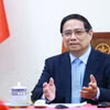 Thủ tướng Phạm Minh Chính điện đàm với Thủ tướng Malaysia Anwar Ibrahim. (Ảnh: Dương Giang/TTXVN)