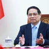 Thủ tướng Phạm Minh Chính điện đàm với Thủ tướng Malaysia Anwar Ibrahim. (Ảnh: Dương Giang/TTXVN)