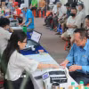 Điểm chi trả lương hưu, trợ cấp bảo hiểm xã hội phường Bạch Đằng (quận Hai Bà Trưng, Hà Nội). (Ảnh: Hoàng Hiếu/TTXVN)