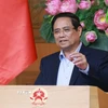 Thủ tướng Phạm Minh Chính chủ trì họp đánh giá sơ kết 1 tháng vận hành chính quyền địa phương hai cấp. (Ảnh: Dương Giang/TTXVN)