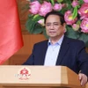 Thủ tướng Phạm Minh Chính chủ trì họp đánh giá sơ kết 1 tháng vận hành chính quyền địa phương hai cấp. (Ảnh: Dương Giang/TTXVN)