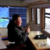 Nhà lãnh đạo Triều Tiên Kim Jong Un giám sát cuộc tập trận phóng tên lửa siêu vượt âm tại Bình Nhưỡng ngày 4/1. (Ảnh: Yonhap/TTXVN)