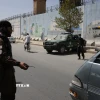 Lực lượng an ninh Afghanistan gác tại hiện trường một vụ tấn công ở Kabul. (Ảnh: THX/TTXVN)