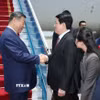 Đồng chí Lương Cường, Ủy viên Bộ Chính trị, Chủ tịch nước Cộng hòa xã hội chủ nghĩa Việt Nam đón Tổng Bí thư, Chủ tịch nước Trung Quốc Tập Cận Bình tại Sân bay quốc tế Nội Bài. (Ảnh: Lâm Khánh/TTXVN) 