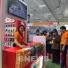 Nhiều sản phẩm chất lượng an toàn thu hút người tiêu dùng tại triển lãm. (Ảnh: Uyên Hương/BNEWS/TTXVN)
