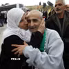 Người thân đón các tù nhân Palestine được trả tự do tại thành phố Ramallah, Khu Bờ Tây, ngày 1/2. (Ảnh: THX/TTXVN)