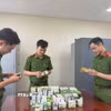 Phòng Cảnh sát Kinh tế triệt phá một đường dây sản xuất, buôn bán thực phẩm chức năng giả. (Ảnh: TTXVN phát)