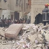 Lực lượng cứu hộ tại hiện trường vụ sập 2 tòa nhà liền kề ở thành phố Fes, Đông Bắc Maroc. (Ảnh: THX/TTXVN)