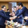 Thủ tướng Phạm Minh Chính với các doanh nghiệp Nhật Bản. (Ảnh: Dương Giang/TTXVN)