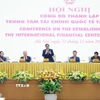 Thủ tướng Phạm Minh Chính chủ trì Hội nghị công bố thành lập Trung tâm Tài chính quốc tế tại Việt Nam. (Ảnh: Dương Giang/TTXVN)