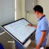Ứng dụng khoa học công nghệ vào phục vụ giải quyết các thủ tục hành chính tại cấp xã, phường ở tỉnh Quảng Trị. (Ảnh: TTXVN phát)