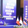 Ông Neak Oknha Kith Meng - Chủ tịch Phòng Thương mại Campuchia (CCC), Chủ tịch Hội đồng Tư vấn kinh doanh ASEAN (ASEAN-BAC) của Campuchia - phát biểu tại phiên khai mạc Hội nghị thượng đỉnh kinh doanh Campuchia-ASEAN 2026. (Ảnh: Huỳnh Thảo/TTXVN)