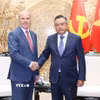 Chủ nhiệm Uỷ ban Kiểm tra Trung ương Trần Sỹ Thanh tiếp Đại sứ Canada tại Việt Nam Jim Nickel. (Ảnh: Phương Hoa/TTXVN)