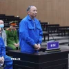 Bị cáo Nguyễn Trọng Đường (cựu Phó Vụ trưởng Vụ Kế hoạch-Tài chính, Bộ Thông tin và Truyền thông, nguyên Giám đốc VNCERT) khai báo trước tòa. (Ảnh: Phạm Kiên/TTXVN)