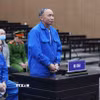 Bị cáo Nguyễn Trọng Đường (cựu Phó Vụ trưởng Vụ Kế hoạch-Tài chính, Bộ Thông tin và Truyền thông, nguyên Giám đốc VNCERT) khai báo trước tòa. (Ảnh: Phạm Kiên/TTXVN)