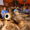 Tháo gỡ các rào cản, khó khăn, tạo điều kiện tối đa để doanh nghiệp nhỏ và vừa bứt phá. (Ảnh: Vũ Sinh/TTXVN)