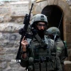 Lực lượng an ninh Israel gác tại Hebron, Bờ Tây. (Ảnh: THX/TTXVN)
