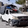 Xe cảnh sát bị hư hại trong một vụ đánh bom ở Quetta, Pakistan ngày 27/3/2025. (Ảnh: THX/TTXVN)