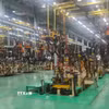 Hệ thống dây chuyền lắp ráp ôtô của Tập đoàn THACO Trường Hải. (Ảnh: Kha Phạm/TTXVN)