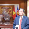 Đại sứ Việt Nam tại Lào Nguyễn Minh Tâm trả lời phỏng vấn. (Ảnh: Xuân Tú/TTXVN)