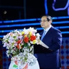 Thủ tướng Phạm Minh Chính phát biểu tại lễ khai mạc Lễ hội Hoa Ban năm 2026. (Ảnh: Dương Giang/TTXVN)