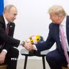 Tổng thống Mỹ Donald Trump (phải) trong cuộc gặp Tổng thống Nga Vladimir Putin tại Osaka, Nhật Bản ngày 28/6/2019. (Ảnh: AA/TTXVN)