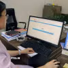 Người lao động hoàn thuế thu nhập cá nhân nhanh chóng nhờ cách thức hoàn thuế tự động. (Ảnh: Hoàng Ngọc/TTXVN)