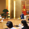 Thủ tướng Phạm Minh Chính chủ trì cuộc họp về phát triển sàn dữ liệu tại Việt Nam. (Ảnh: Dương Giang/TTXVN)