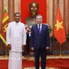 Tổng Bí thư, Chủ tịch nước Tô Lâm và Đại sứ Sri Lanka tại Việt Nam Poshitha Perera chụp ảnh chung. (Ảnh: Lâm Khánh/TTXVN)
