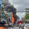 Vụ cháy cửa hàng điện thoại trên đường Xô Viết Nghệ Tĩnh, phường Ninh Kiều, thành phố Cần Thơ sáng 10/7. (Ảnh: TTXVN phát)