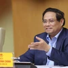 Thủ tướng Phạm Minh Chính chủ trì phiên họp về phát triển nhà ở xã hội. (Ảnh: Dương Giang/TTXVN)