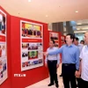 Phó Thủ tướng Mai Văn Chính kiểm tra công tác chuẩn bị triển lãm ảnh tại Đại hội đại biểu Đảng bộ Chính phủ lần thứ nhất, nhiệm kỳ 2025-2030. (Ảnh: Tuấn Anh/TTXVN)