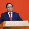 Bí thư Đảng ủy Chính phủ, Thủ tướng Chính phủ Phạm Minh Chính phát biểu chúc mừng. (Ảnh: Dương Giang/TTXVN)