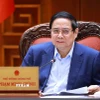 Thủ tướng Phạm Minh Chính chủ trì họp Thường trực Chính phủ về phát triển Đề án Khu thương mại tự do và Trung tâm lọc hóa dầu và năng lượng quốc gia tại Dung Quất. (Ảnh: Dương Giang/TTXVN)
