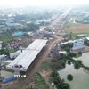Phần đường cao tốc của đường Vành đai 3 Thành phố Hồ Chí Minh đoạn qua tỉnh Long An sẽ hoàn thiện và tiến hành thông xe kỹ thuật trước ngày 31/12 năm nay. (Ảnh: Bùi Giang/TTXVN)