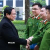 Thủ tướng Phạm Minh Chính thăm, chúc Tết cán bộ, chiến sỹ Cục Cảnh sát quản lý hành chính về trật tự xã hội (Bộ Công an). (Ảnh: Dương Giang/TTXVN)